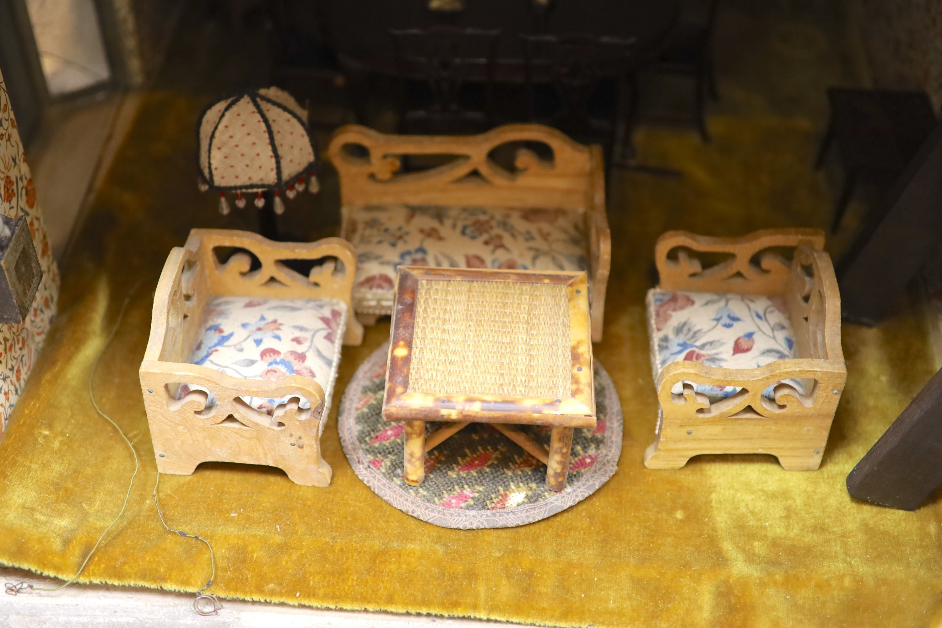 An unusually large painted pine doll's house, modelled upon a Victorian lodge house, Estate Carpenter made, Lake District width 198cm height 156cm